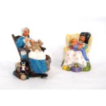 Two Royal Doulton figures, 'Nanny' HN 2221, and 'Sweet Dreams' HN 2380, 14cm and 13cm high.   (2)