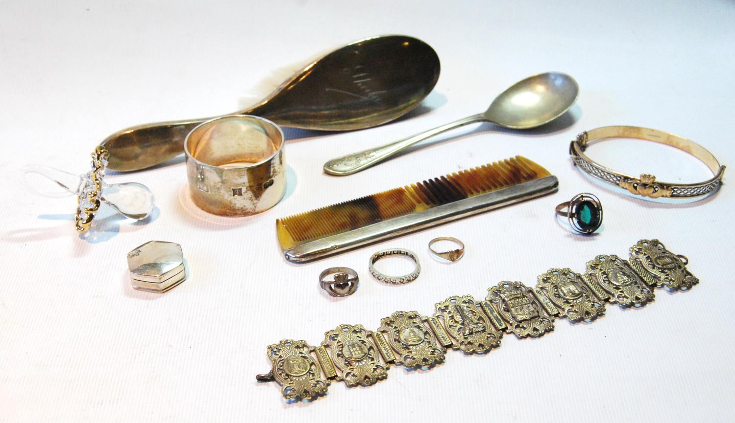 Silver napkin ring, child's hair brush and various silver and other items.