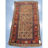 Talish rug, c. 1850, with lattice work field, beige ground and triple border, 203cm x 95cm.