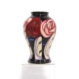 Moorcroft Trial vase of baluster form decorated with roses, marked to the base Trial 12-11-14,