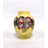 Moorcroft Clematis vase with yellow ground, marks to the base, 13cm high.