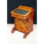 Victorian walnut Davenport, the moulded top enclosing fitted interior over hinged slope with skiver,
