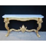 Marble topped giltwood console table, the serpentine top over beaded frieze, acanthus cabriole