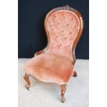 Victorian button-back lady's chair with serpentine cushioned seat and raised on cabriole legs