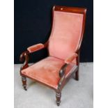 19th century mahogany-framed armchair with cushioned back and seat, raised on baluster turned legs