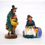 Two Royal Doulton figures, 'The Mask Seller' HN 2103, and 'Silks and Ribbons' HN 2017, 21.5cm and