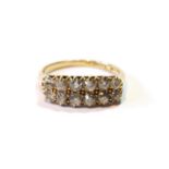 Edwardian 18ct gold ring with two rows of six old-cut diamonds, size O.