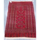 Belouch prayer rug with five guls, square mihrab, multiple border and star ends, 159cm x 99cm.