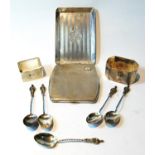 Silver cigarette case, a pin tray, five coffee spoons and two napkin rings, 9oz.