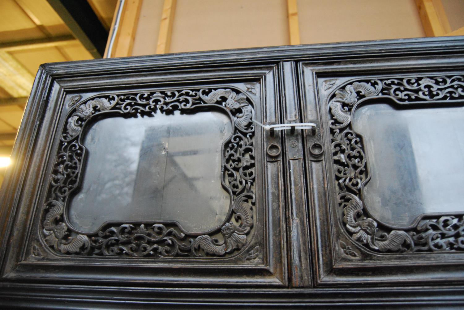 Chinese cabinet of rectangular form with pierced fretwork, mirrored doors, panelled doors and - Image 5 of 11