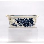 Late 18th century Worcester butter tub of oval form with opposing handles, blue floral transfer