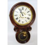 Mid to late 19th century American faux rosewood wall clock, by E. Ingraham, Bristol, Conn., in