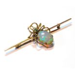 Opal and emerald brooch modelled as a spider, upon a plain pin, probably 15ct gold, c. 1900.