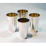 Nest of four silver hunting beakers of plain tapering shape with gilt interiors, Birmingham 1923,