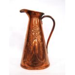 Aesthetic copper jug by Joseph Sankey & Son of tapering form with embossed, stylised flowers, 28cm