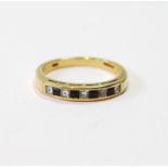 18ct gold ring with baguette rubies and diamonds, 1973, size P, 4.2g.