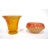 Vasart Scottish glass vase and bowl, the flared vase, in orange, with green and red highlights,