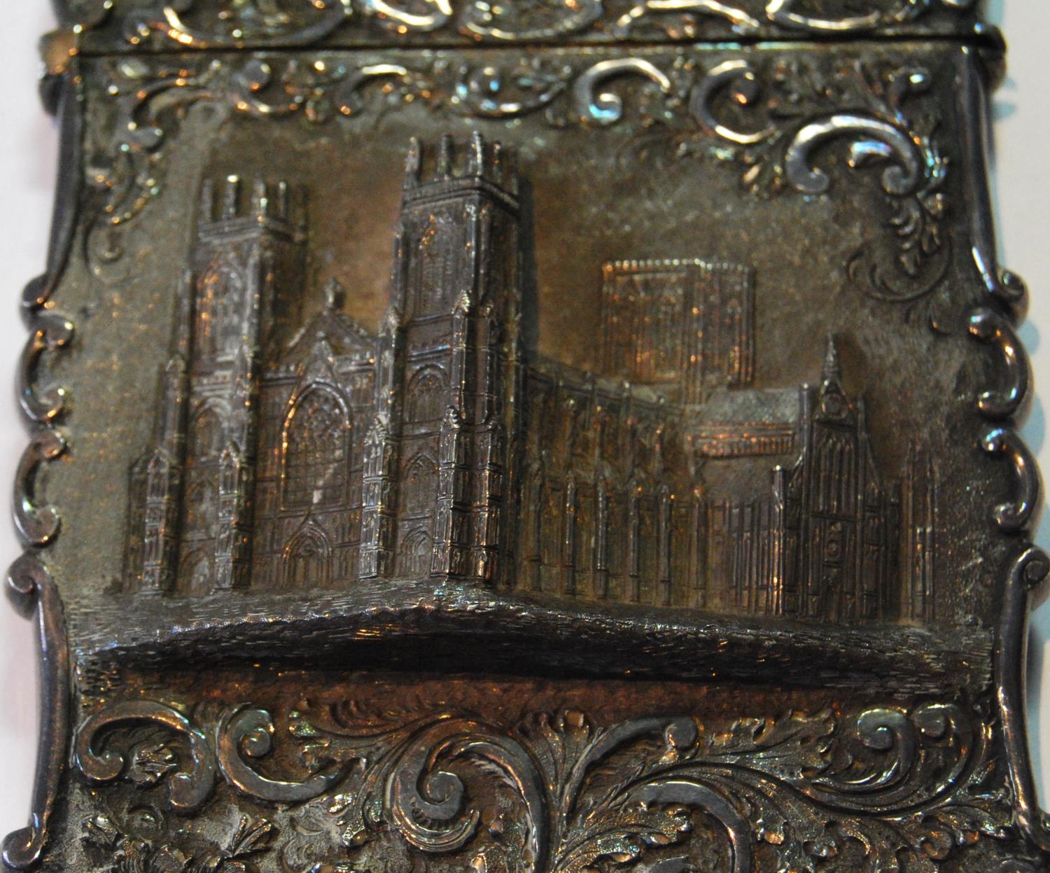 Silver 'castle top' card case with a view of York Minster in high relief amongst scrolls by - Image 2 of 4
