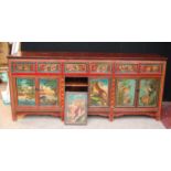 Chinese overpainted sideboard, the rectangular top over six frieze drawers and cupboards, raised