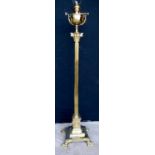 Brass Corinthian column standard lamp with paraffin bowl over fluted column, stepped plinth base and