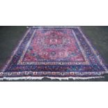 Meshed carpet with all over floral design, central rosette, spandrels, blue and cream border,