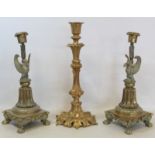 Pair of Victorian brass candlesticks, the sconces on reeded and foliate moulded flared columns