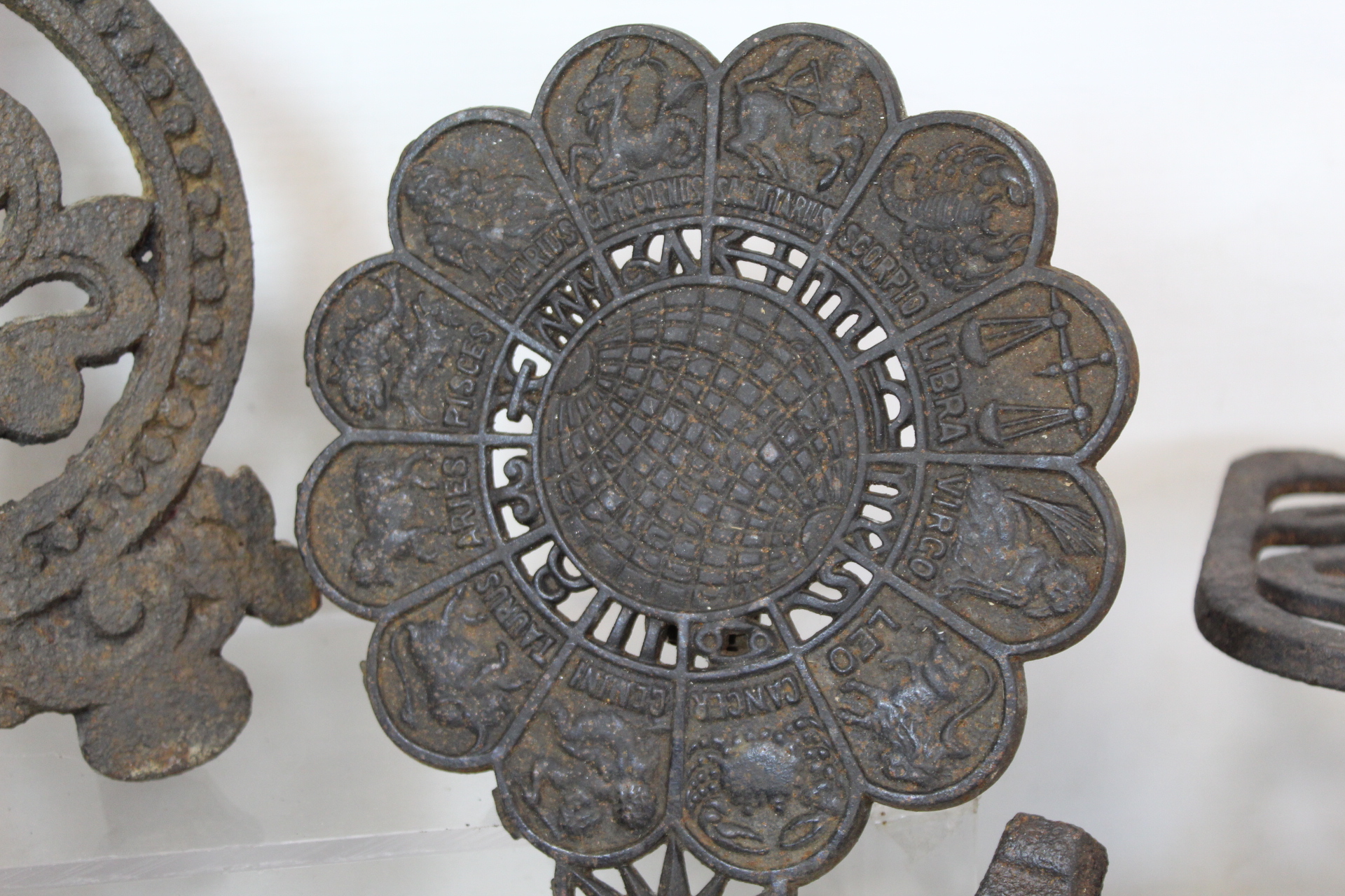 Four Victorian cast iron grate trivets incl. one of horseshoe form inscribed "Good Luck" and one - Image 3 of 6