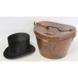 Victorian/Edwardian leather hat box with initials "A.L" containing a Lincoln Bennett & Co. black top