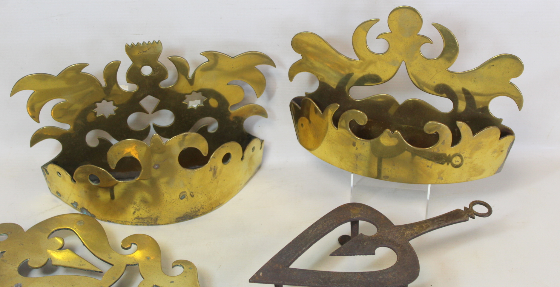 Two Victorian brass half ornaments with pierced scrolled decoration; two brass trivets of pierced - Image 2 of 6