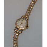 Lady's 9ct gold bracelet watch.