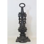 Victorian cast iron doorstop with ring handle baluster column with foliate moulding and harebell