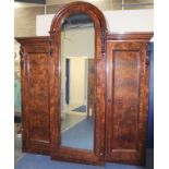Victorian mahogany arch topped breakfront triple door wardrobe the centre section with fitted