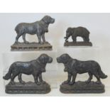 Pair of Victorian cast iron doorstops or half ornaments in the form of St. Bernard dogs, each 18cm