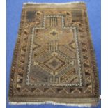 Afghan tribal prayer rug with hooked medallions in the mihrab surrounded by geometric guard