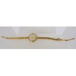 Cymaflex 9ct gold lady's bracelet watch, 12.8g without movement .