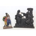 Victorian cast iron doorstop with biblical scene of Rebecca at the well, 26cm high and another of