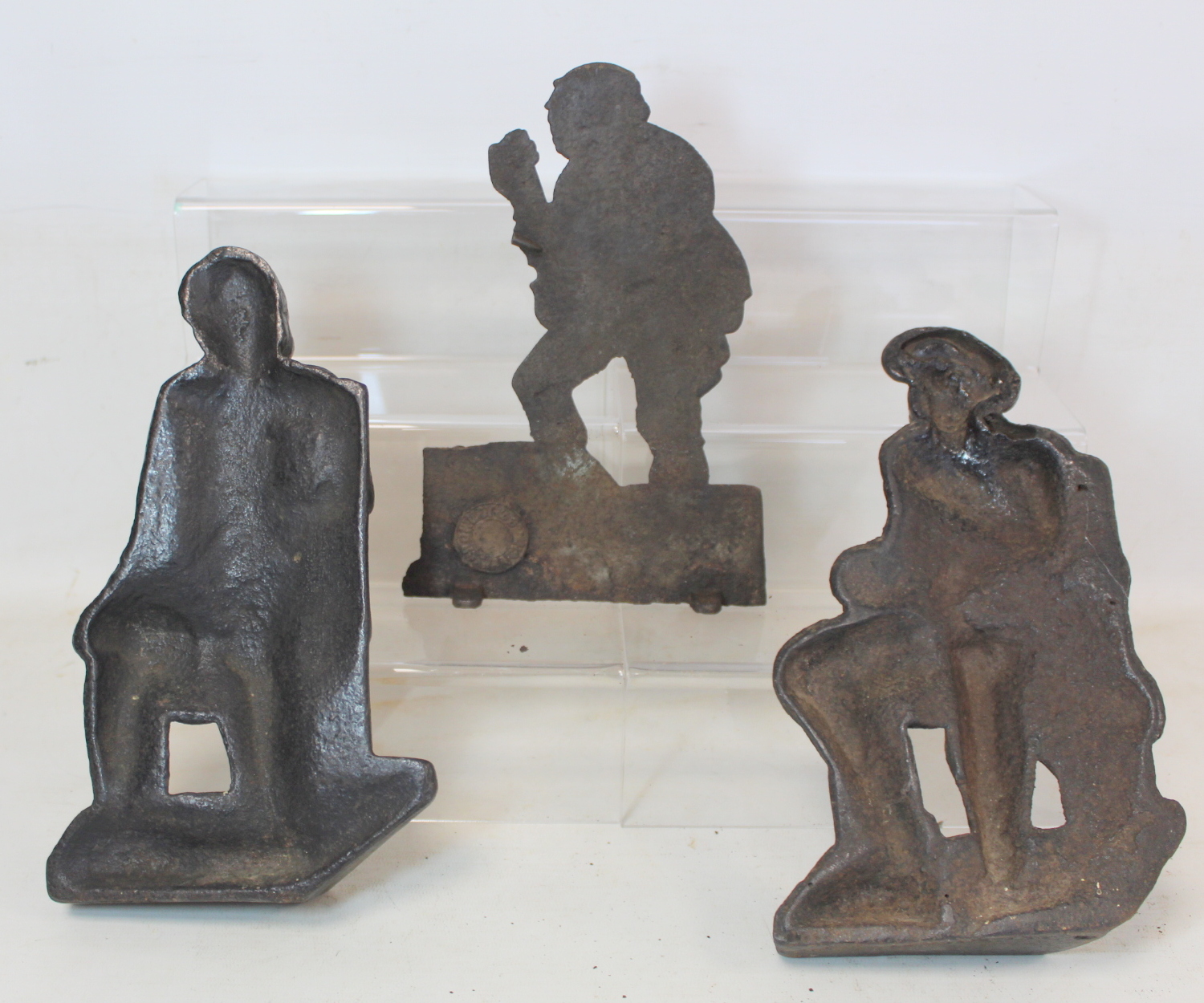 Pair of Victorian black painted cast iron doorstops or half ornaments depicting two seated men - Image 2 of 3