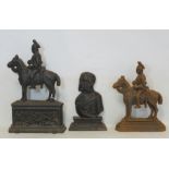 Two Victorian cast iron doorstops in the form of Crimean officers on horseback, 34cm and 26.5cm