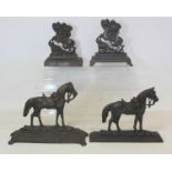 Two Victorian cast metal chimney ornaments depicting Napoleon crossing the Alps on horseback and two