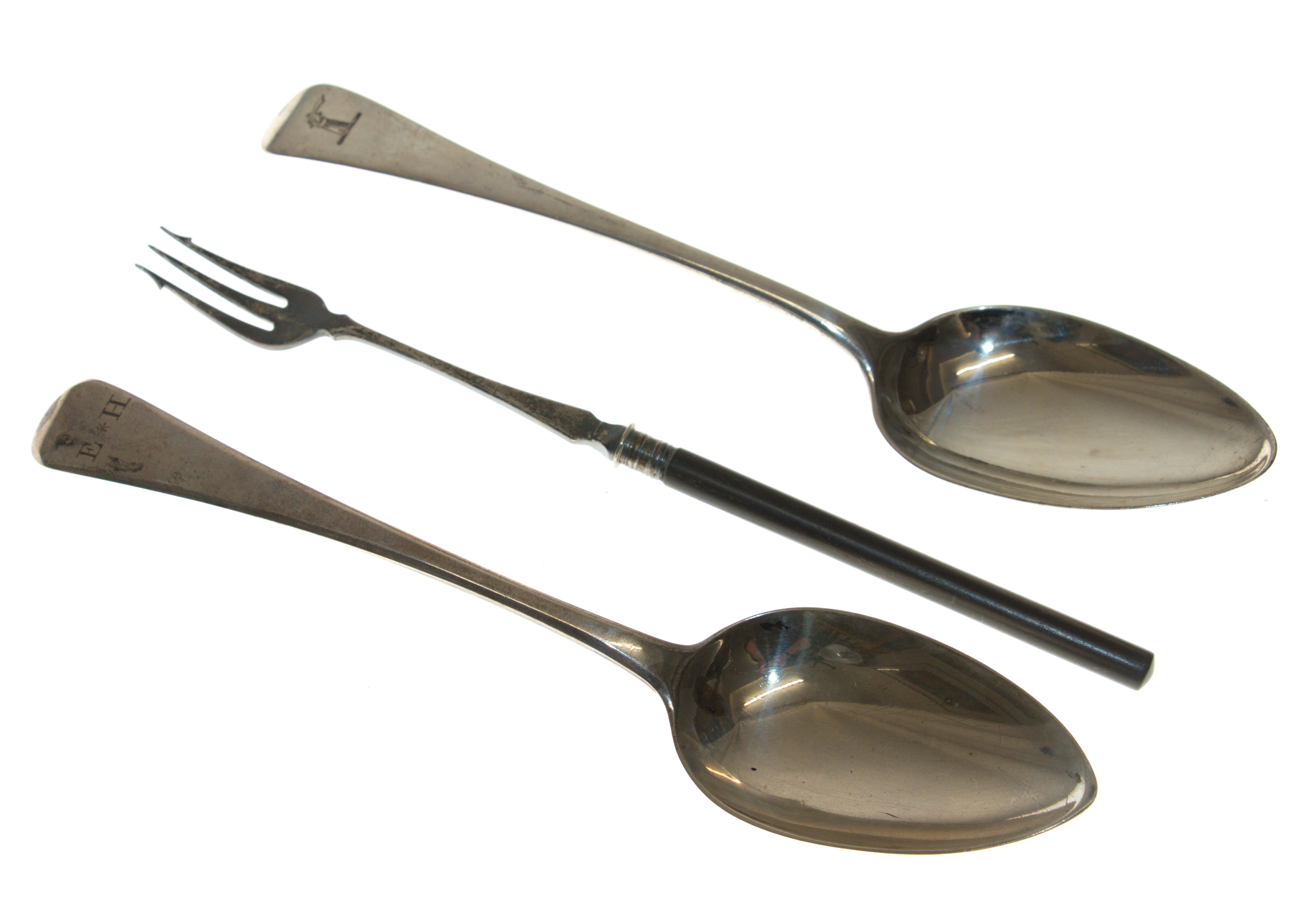 Two silver table spoons, crested and initialled 1804/5 and an e.p. pickle fork. (3).