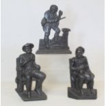 Pair of Victorian black painted cast iron doorstops or half ornaments depicting two seated men