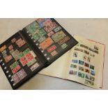 A collection of world stamps in seven albums and loose