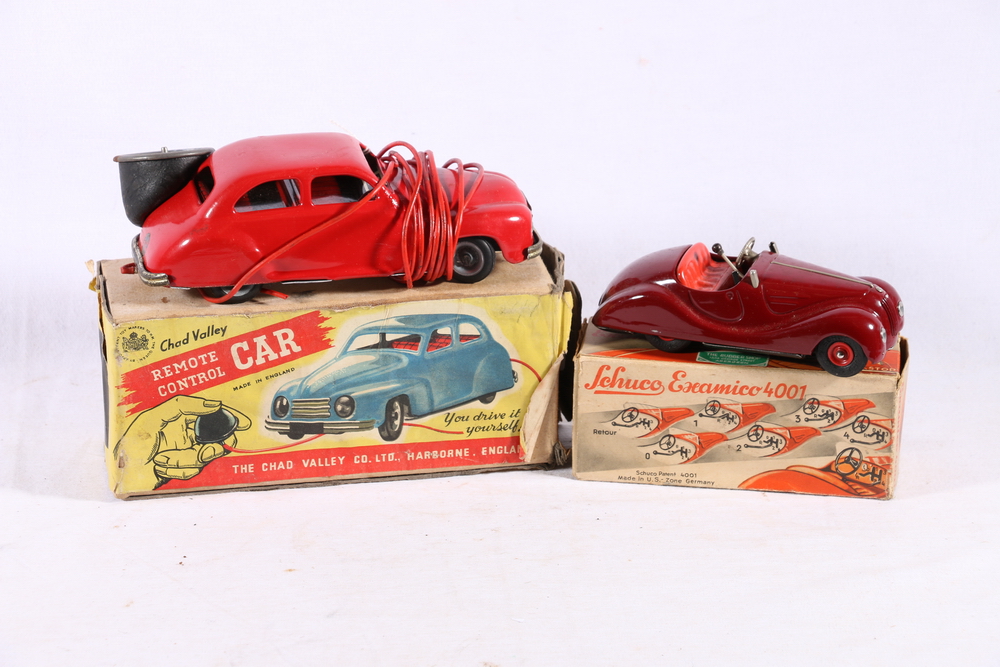 Schuco Examico 4001 clockwork motor car boxed and a Triang Minic clockwork toys scale model and a