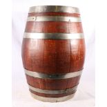 A small coopered oak whisky cask, perhaps a firkin or a kilderkin with white metal rungs, painted