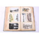 An Edwardian Art Nouveau postcard album containing around 150 postcards of mixed interest and