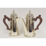 Pair of silver cafe au lait pots of plain early 18th century tapering shape, side handles, 1979,