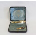 Victorian gold hinged bangle "15" with mannequin "fumsup" charm, '9'.
