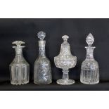 Three 19th century cut glass decanters, the largest 30cm high and a cut glass pedestal sweetmeat