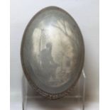 19th century Australian cameo carved emu egg depicting a wood cutter by a camp fire, 12cm high,