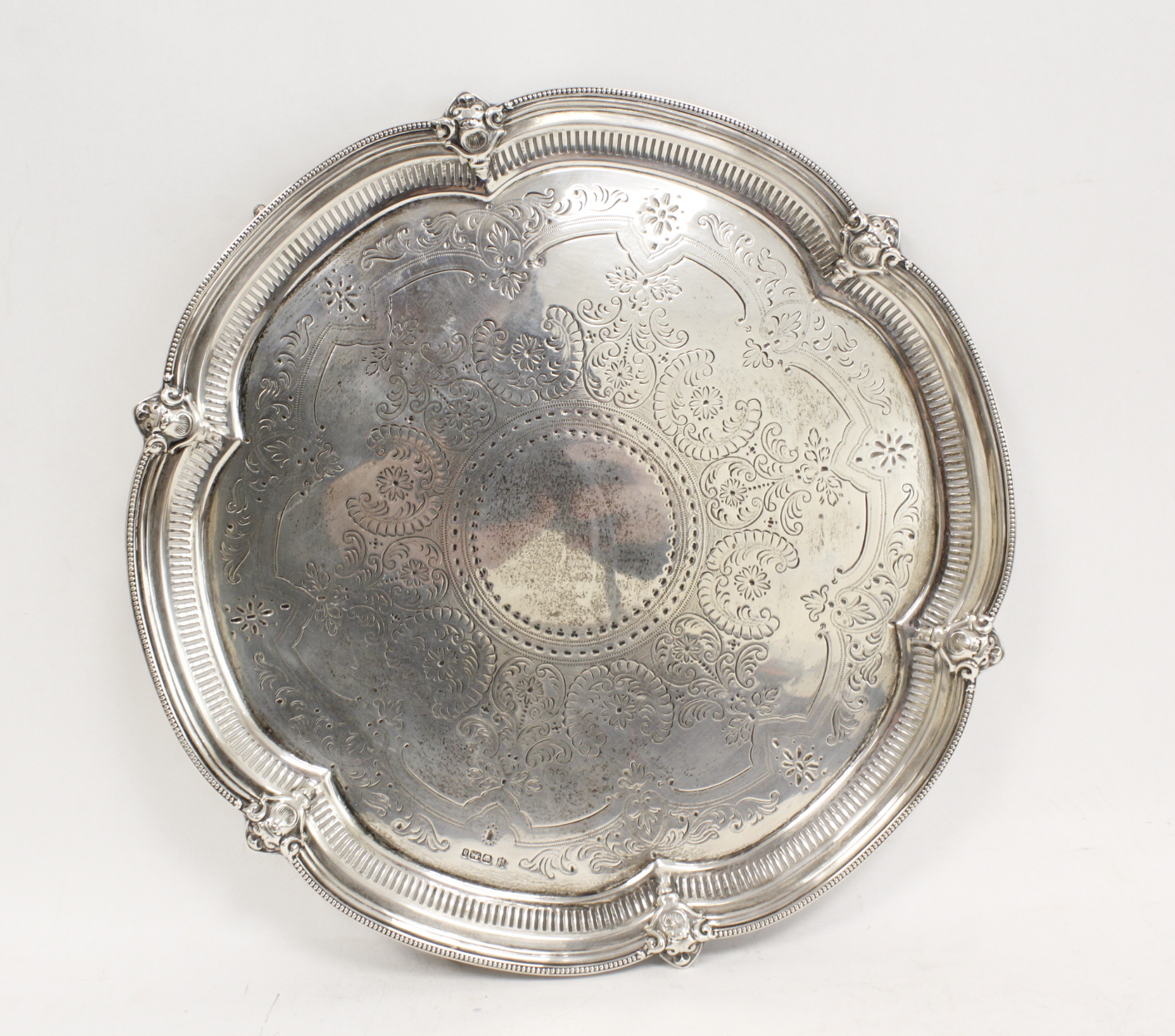 Silver circular tray with hexafoil lobed pierced and mounted border by Coopers, Sheffield 1900,